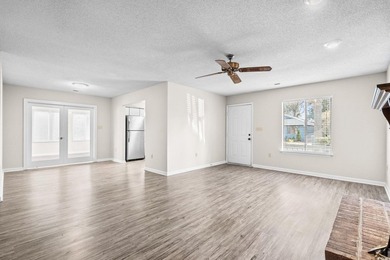 Live just half a mile from the beach, this charming patio home - photo 8