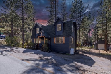 Income averaging $5k monthly this home is -Tucked against a - photo 1