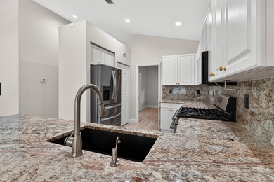 Welcome to this well-maintained 3-bedroom, 2-bath home in The - photo 14