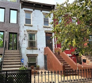 1051 Herkimer Street is a three-story, two-family brick - photo 1