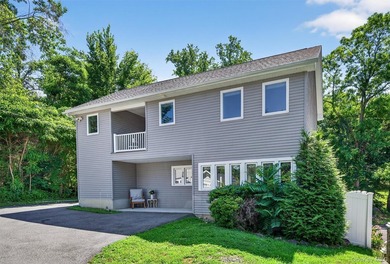 Experience the magic of lake living! Beautifully maintained home - photo 2