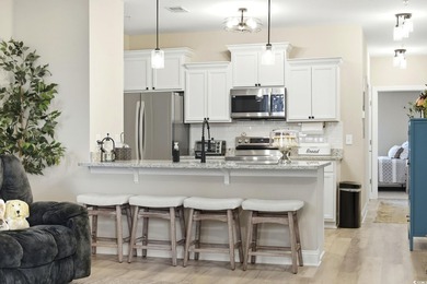 Price Improvement!!! Welcome to 165 Ella Kinley Circle Unit 302!