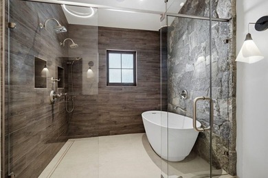 A striking blend of modern mountain architecture and refined - photo 16