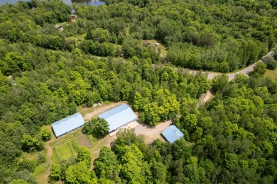 Barndominium living! If you love to play-this property is for - Lake Home For Sale in Crandon, Wisconsin