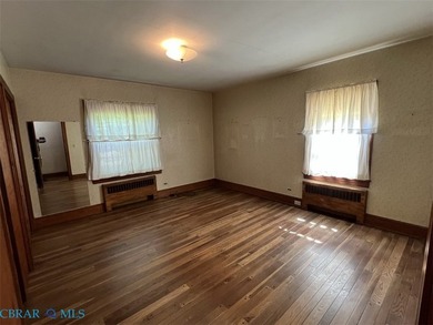 Classic Urbanna brick rancher located just a short walk away - photo 9