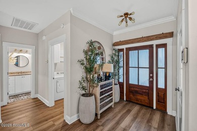 Welcome home to this thoughtfully upgraded 4-bedroom - photo 2