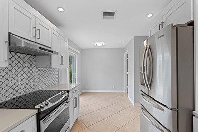 Welcome home to the highly desirable gated community of the - photo 12