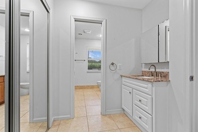 Welcome home to the highly desirable gated community of the - photo 14