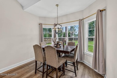 Welcome home to this thoughtfully upgraded 4-bedroom - photo 7