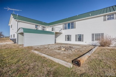 Versatile Estate on 9.8 Acres with Dual Living Quarters & Income