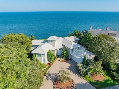 Set high on a scenic bluff in New Seabury, this contemporary - photo 2