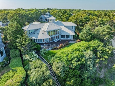 Set high on a scenic bluff in New Seabury, this contemporary - photo 3