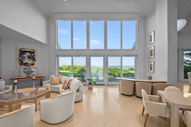 Set high on a scenic bluff in New Seabury, this contemporary - photo 10