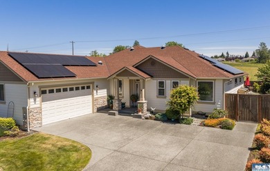 Come home to one of Sequim's premier neighborhoods! Located just - photo 1