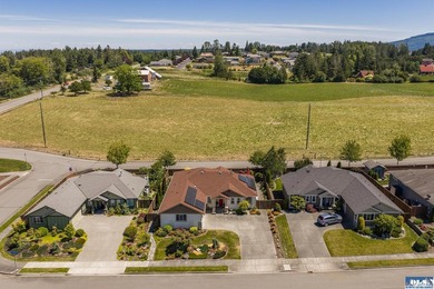 Come home to one of Sequim's premier neighborhoods! Located just - photo 3