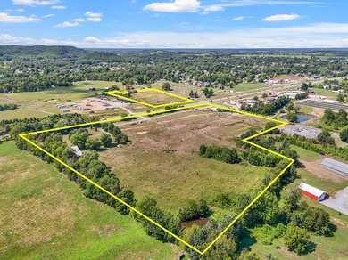 Discover 20 +/- acre of land poised for business development in - photo 2