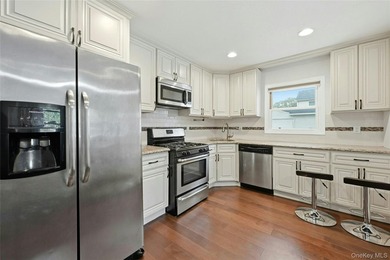 Perfection awaits in this 2 bed 1 bath 730 sq ft Ranch with an - photo 3