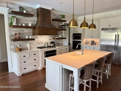 Welcome to 47 Dorsey Circle, the epitome of privacy and luxury! - photo 2