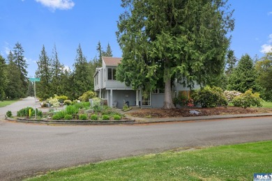 Panoramic golf-course views anchor this light-filled two-story - photo 2