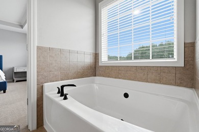 Welcome to this beautifully maintained 4-bedroom, 2.5-bath - photo 13