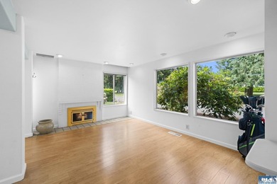 Panoramic golf-course views anchor this light-filled two-story - photo 6