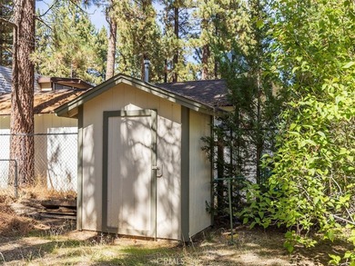 This charming 2-bedroom, 1-bath cabin sits on a quiet street in - photo 18