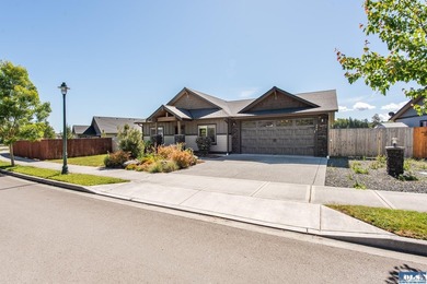 This beautifully maintained 2022 home offers effortless living - photo 1
