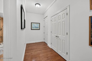 A rare opportunity to own a top-floor, rear corner residence in - photo 2