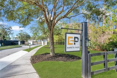 Beautiful home located in the desirable Egrets Pass, a private - photo 2