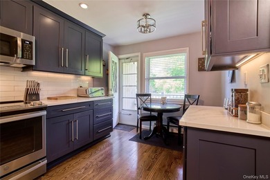 Welcome home to this bright and inviting remodeled 1st floor - photo 5
