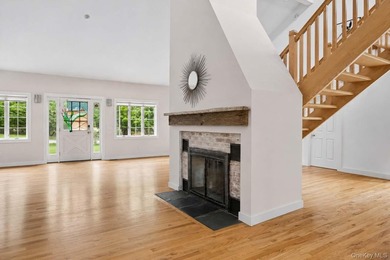 Set on a private 1.18-acre property in Hampton Bays, this - photo 10