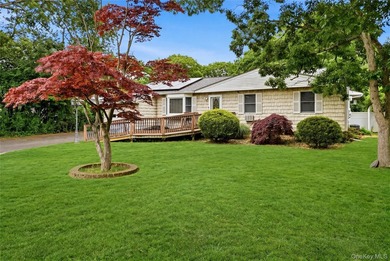 Located on a beautiful flat half-acre of property, this - photo 1