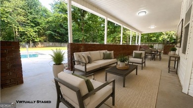 Welcome home to this stately 4-sided brick ranch tucked away on - photo 4
