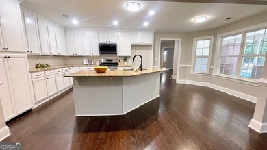 Welcome home to this stately 4-sided brick ranch tucked away on - photo 7