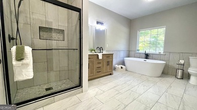 Welcome home to this stately 4-sided brick ranch tucked away on - photo 9