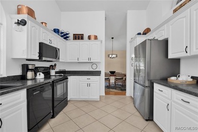 Enter to vaulted ceilings, beautiful bamboo floors in living and - photo 13