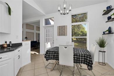 Enter to vaulted ceilings, beautiful bamboo floors in living and - photo 14