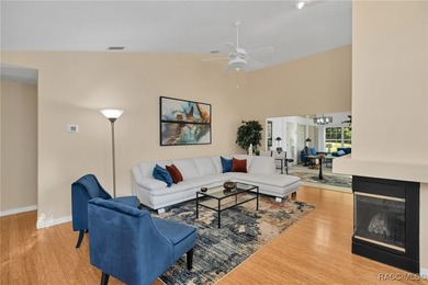 Enter to vaulted ceilings, beautiful bamboo floors in living and - photo 16