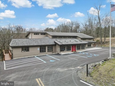 With Parking lot expanded, repaved, and restriped, retaining - photo 1