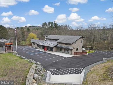 With Parking lot expanded, repaved, and restriped, retaining - photo 7