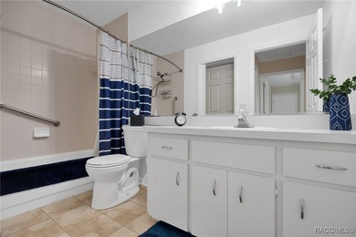 Enter to vaulted ceilings, beautiful bamboo floors in living and - photo 31