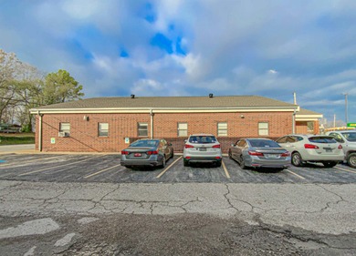 Commercial building in the heart of town. This all-brick