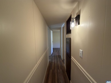 Well-kept and updated 2 bedroom, 1.75 bath manufactured home on - photo 7