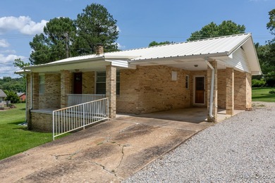 2 bedroom 1 bath brick home with a view of the Spring river - photo 1