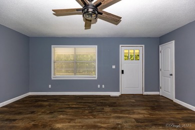 2 bedroom 1 bath brick home with a view of the Spring river - photo 5