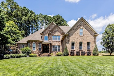 Your private sanctuary awaits in this custom-built brick and - photo 1