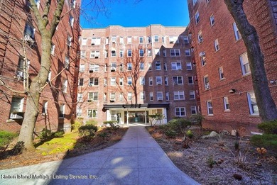 LOCATED IN THE HEART OF MIDWOOD, ON A BEAUTIFUL TREE-LINED