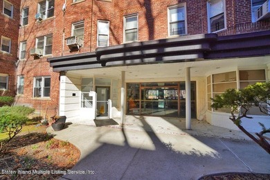 LOCATED IN THE HEART OF MIDWOOD, ON A BEAUTIFUL TREE-LINED