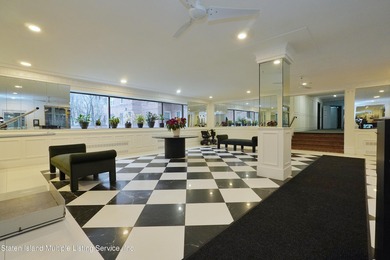 LOCATED IN THE HEART OF MIDWOOD, ON A BEAUTIFUL TREE-LINED