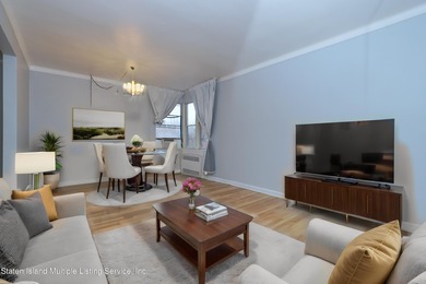 LOCATED IN THE HEART OF MIDWOOD, ON A BEAUTIFUL TREE-LINED